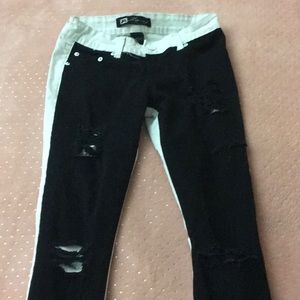 Black and white dual colored ripped jeans